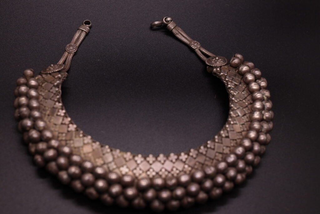 Gilded Echoes: Triple-Tier Collar