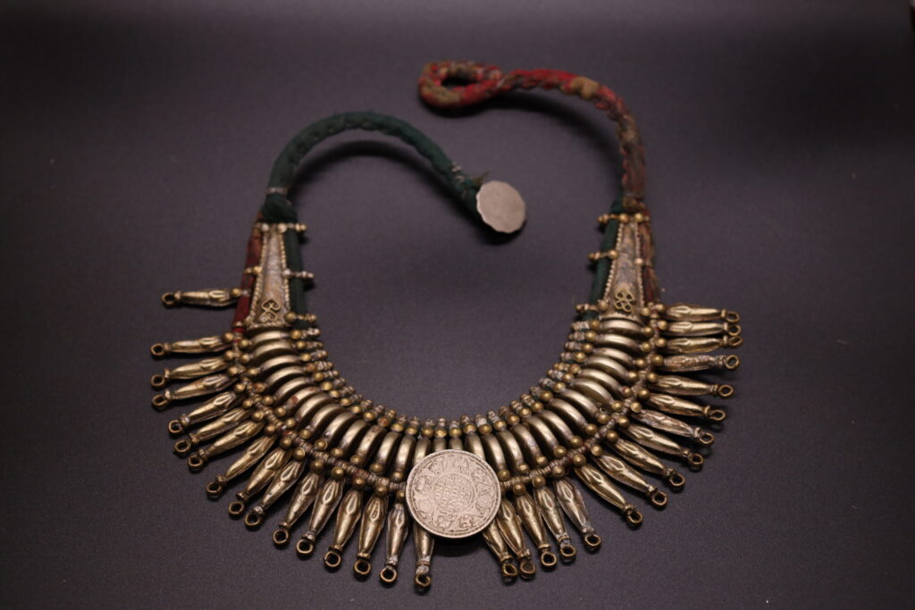 Crescent of Tides: Brass Drop Necklace